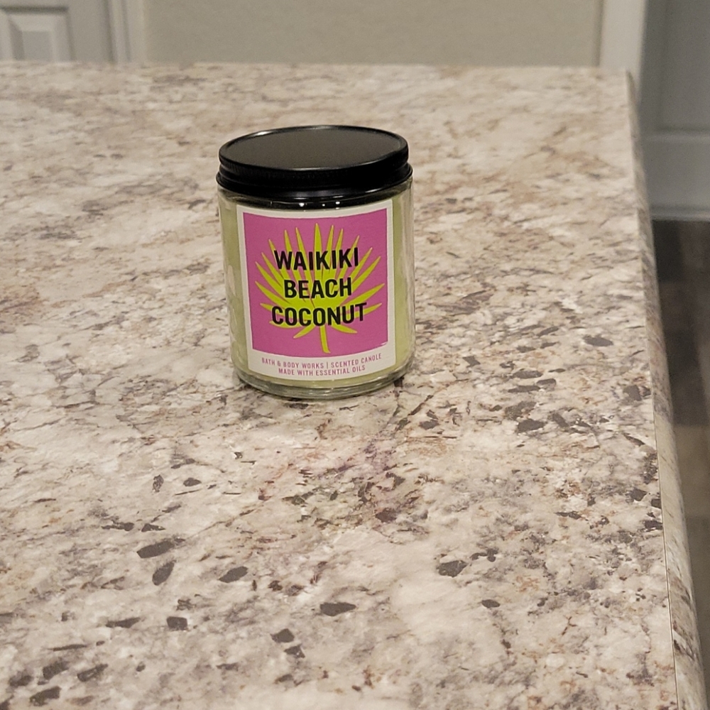 Single wick Bath and Body Works candle.